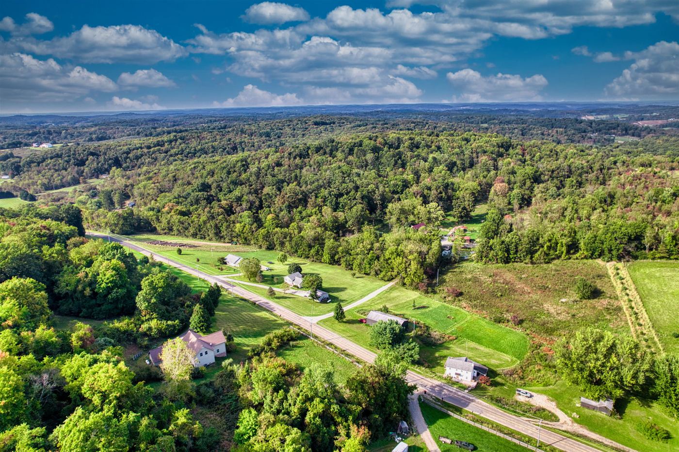 Aerial view over the property and surrounding hills