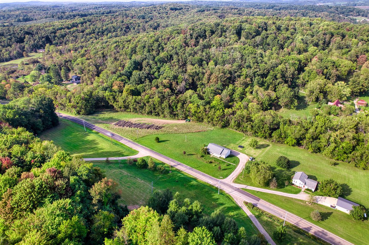 Aerial view of the home site and lane